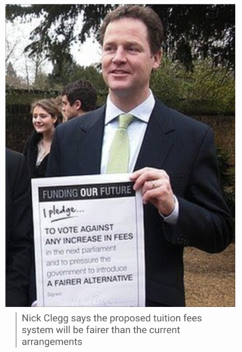 Nick Clegg holds a sign that says
he will not vote for increases in university fees