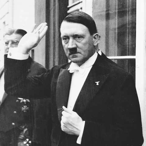 Adolf Hitler in a tuxedo, including a white bow tie