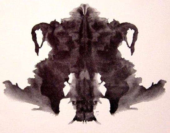 A Rorschach ink blot that looks like
the shape of AL-07, except with both sides of the run-over squirrel instead of just the right half