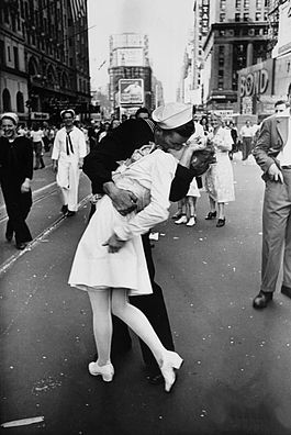 Sailor kissing nurse on V-J Day