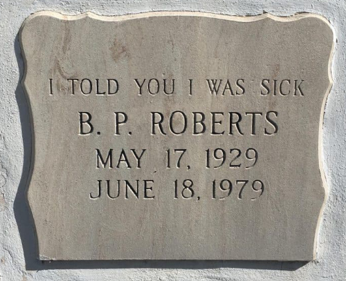The headstone says: 'I told you I was sick'