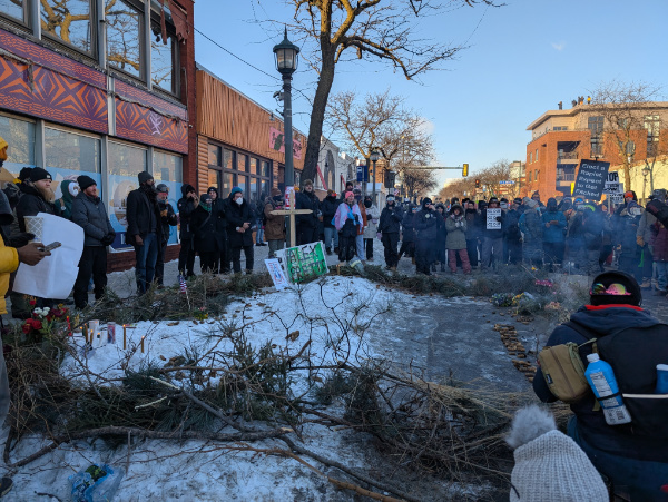 An impromptu memorial on the site where Pretti died.