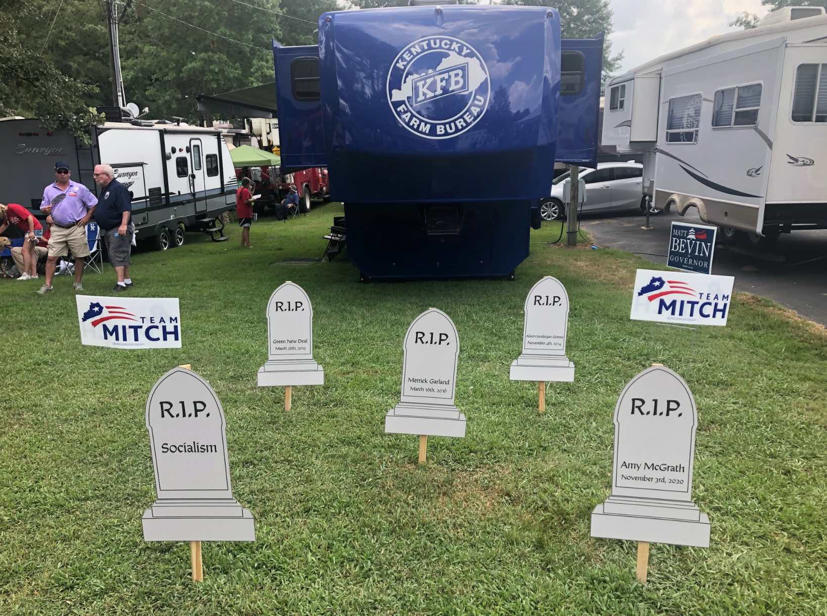 Five gravestones with McConnell's enemies