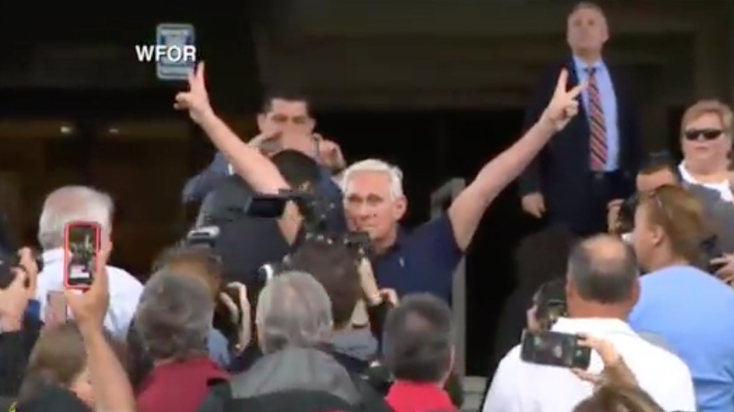 Stone adopts Nixon victory pose