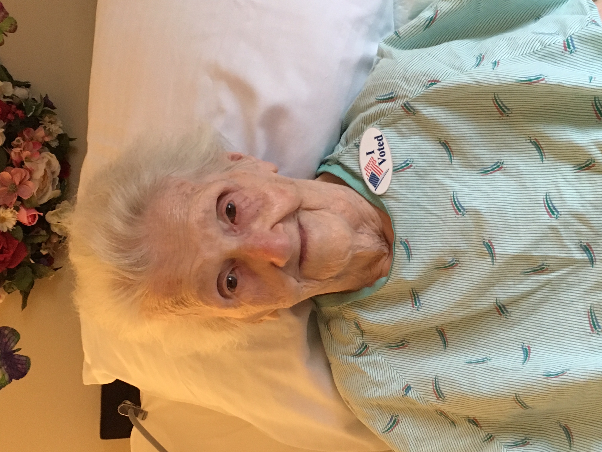 The author's mother is wearing
a hospital-type gown with an 'I Voted' sticker.