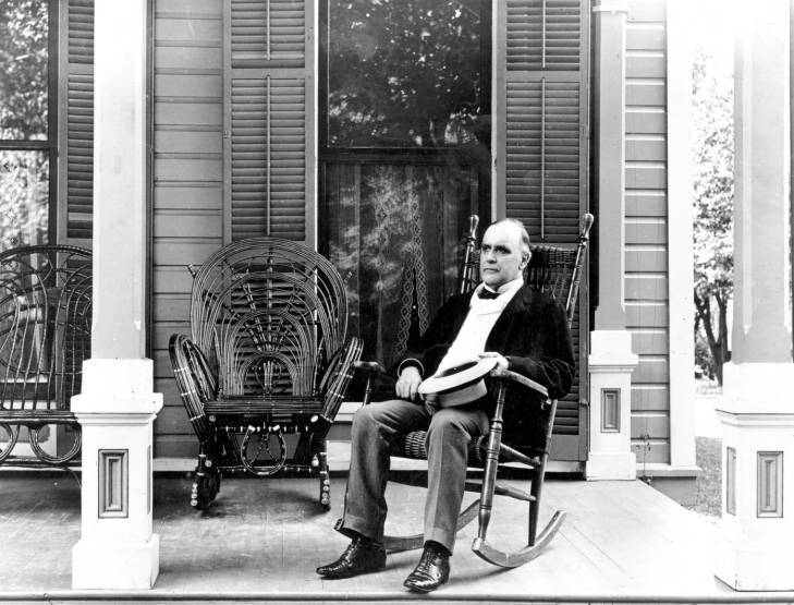 William McKinley, in his
suit on his front porch, sitting in a rocking chair and holding a straw hat