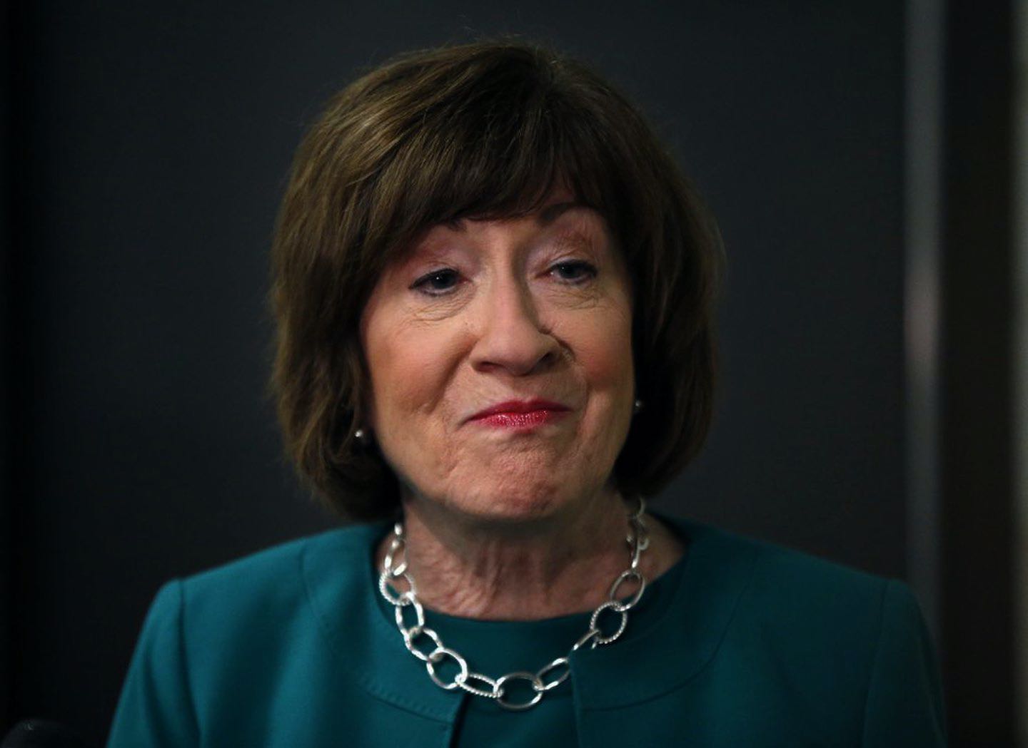 Susan Collins half-smiling