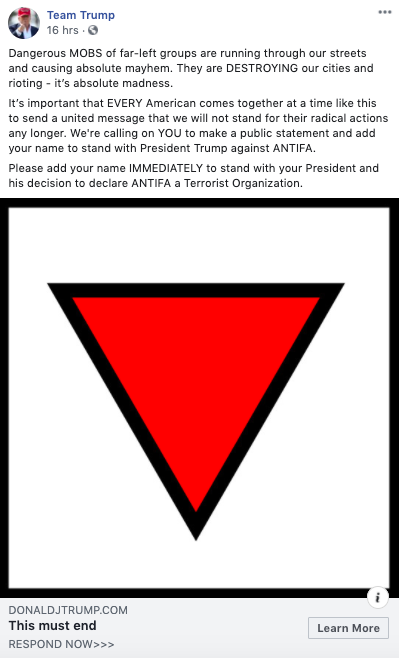 An ad bitching about Antifa is accompanied
by a giant upside-down red triangle