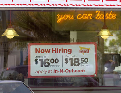 Sign advertising $16/hour wage at In-N-Out Burger