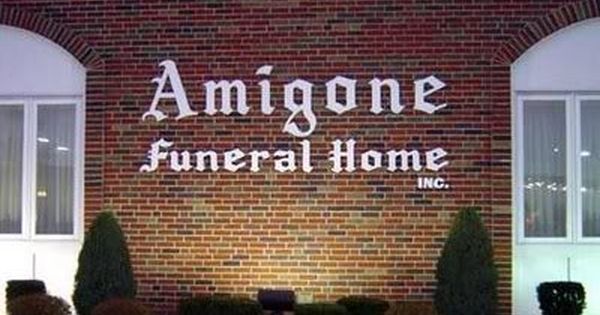 Sign for Amigone Funeral Home