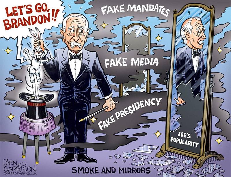 Joe Biden is shown as a magician
pulling a rabbit out of a hat; the rabbit is declaring 'Let's go Brandon!' There is smoke billowing around him that has 
the phrases 'fake mandates,' 'fake media,' and 'fake presidency.' Biden's reflection is shown in a mirror that is labeled
'Joe's popularity' and is broken. The caption is: 'smoke and mirrors.'