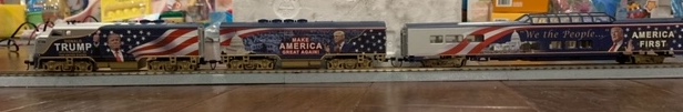 A model train adorned with
Trump pictures and slogans