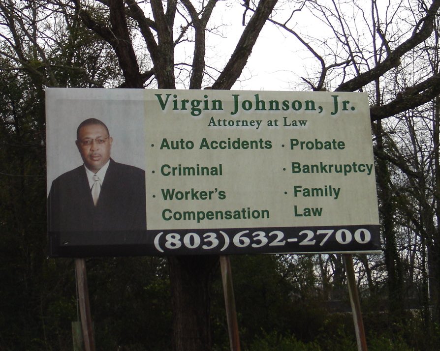 A billboard for an attorney named Virgin Johnson Jr.