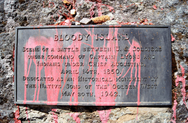 A plaque describing
the engagement at Bloody Island has substantial amounts of bright-red paint on it