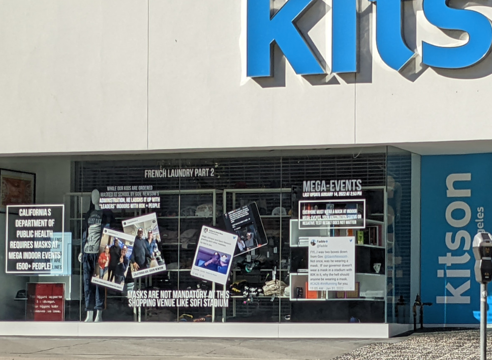 The display window has a bunch of text mocking 
Gov. Gavin Newsom, D-CA, like 'French Laundry, Part 2' and 'Masks are not mandatory at this venue, like at SoFi Stadium