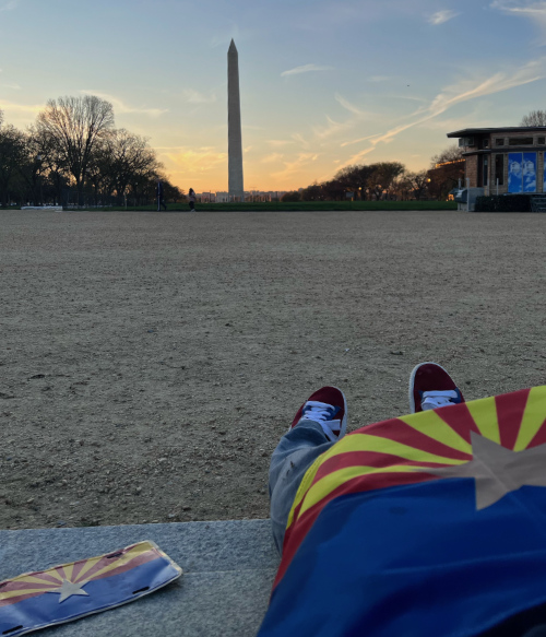 You can see the author's feet, a 
license plate with an Afghan flag next to them, and the Washington Monument in the background