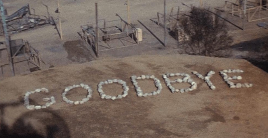 A shot from the final scene of
the final episode of M*A*S*H, where B.J. has spelled out 'good bye' for Hawkeye to see as Hawkeye leaves via helicopter