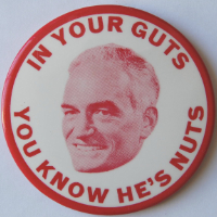A pin says 'In your guts, you know he's nuts' and has a picture of Barry Goldwater
