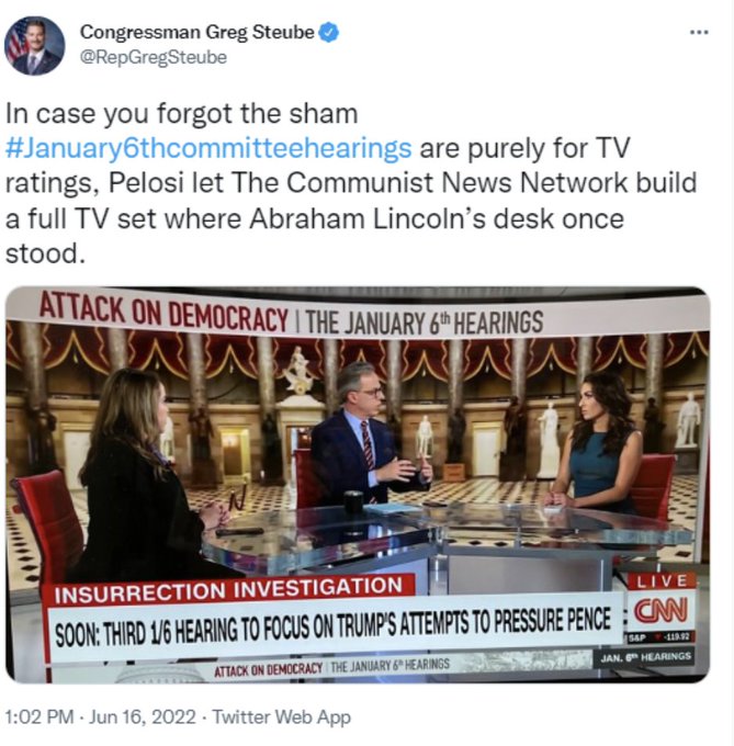 It shows a picture of CNN's 
coverage, and reads 'In case you forgot the sham #January6thcommitteehearings are purely for TV ratings, Pelosi let The
Communist News Network build a full TV set where Abraham Lincoln's desk once stood.'