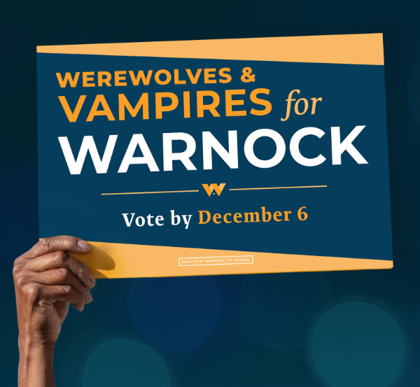 A yard sign says 'Werewolves and Vampires for Warnock;
Vote December 6