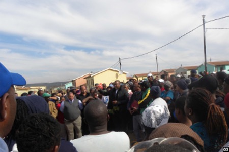 A crowd in a small town or village