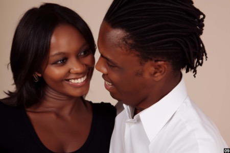 A couple, her in black, him in white