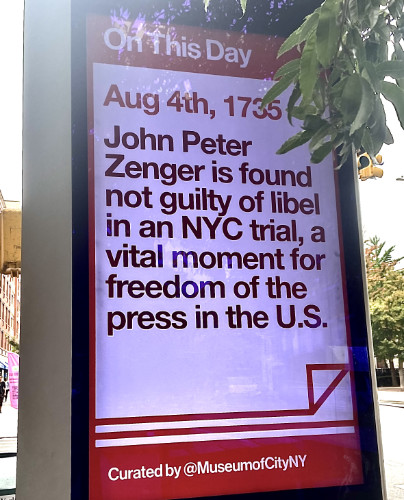 A bus stop in New York City has an electronic sign honoring the anniversary of the John Peter Zenger trial