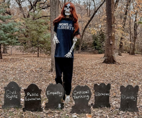 A skeleton with a Moms for Liberty shirt hovers over graves labeled 'civil rights,'
'public education,' 'empathy,' 'critical thinking,' 'libraries,' and 'diversity.'