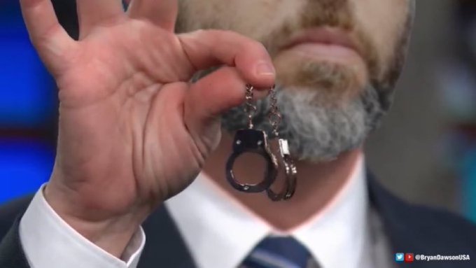 A pair of tiny handcuffs