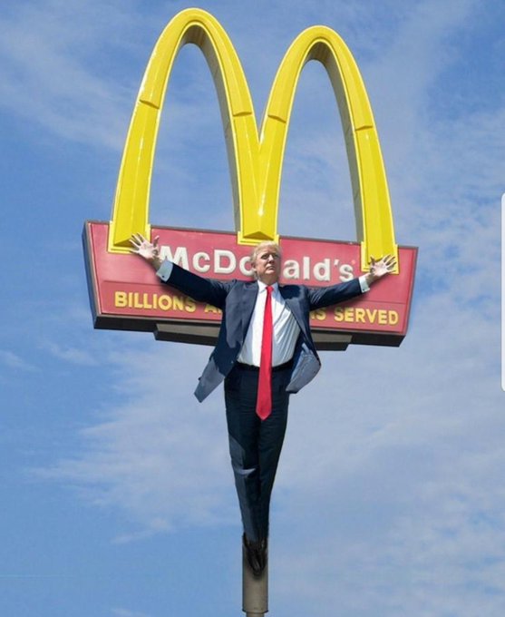 Trump cruicifed, but on a McDonald's sign