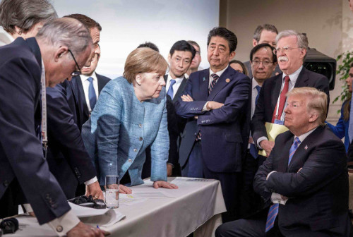 Angela Merkel glares at Trump at the G-7