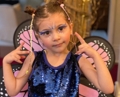 Little girl in a butterfly costume