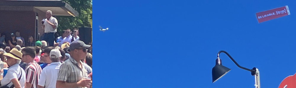 RFK speaking and
a plane flying a banner that says 'Be likable, Ron!'