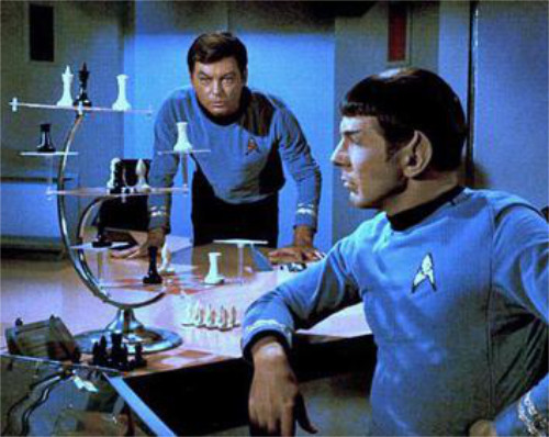 Spock, from 'Star Trek,' plays 3-D chess
while Dr. McCoy looks on