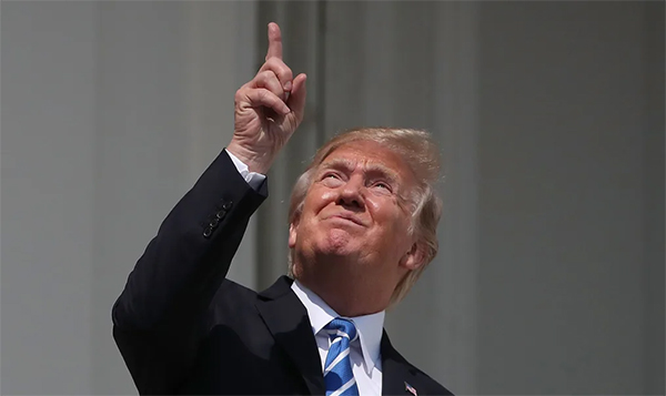 Trump looking at the 2017 eclipse without glasses