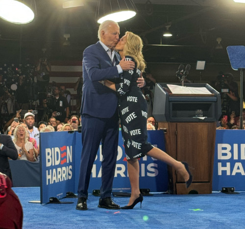 The Bidens share a kiss
