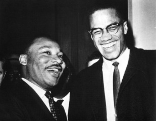 Malcolm X and MLK laughing