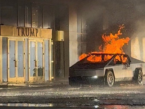 A flaming cybertruck has crashed into the 
side of Trump Tower