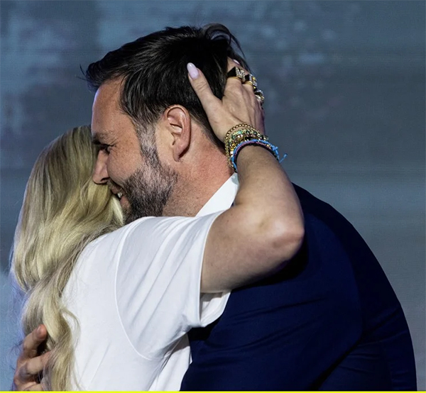 Erica Kirk hugging J.D. Vance intensely