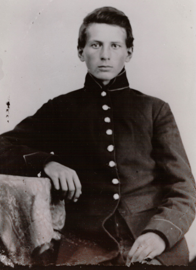 A black and white photo
of a very young man in a Union uniform.
