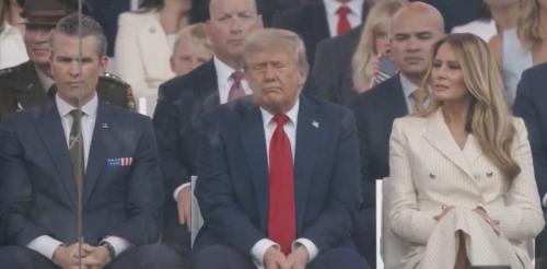 Pete Hegseth,
Donald Trump and Melania Trump sit behind bulletproof glass, and all three look bored