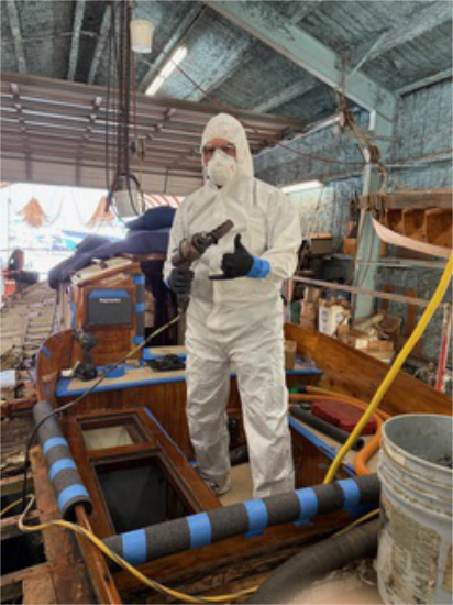 The reader is wearing a white
hazmat suit