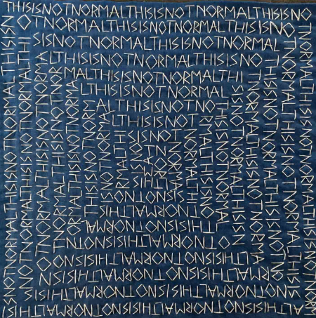 The phrase 'This
is not normal' repeated over and over, in a spiral pattern