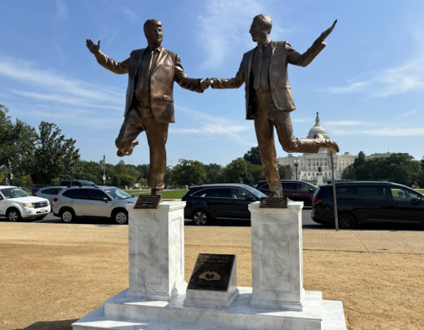 Donald Trump and Jeffrey Epstein
holding hands, in a manner that makes it look like they are dancing