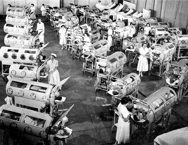 A
room full of patients in iron lungs