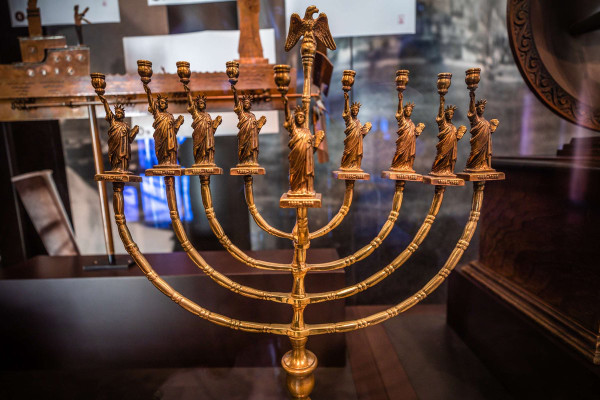 A menorah where each candle
holder is a mini statue of liberty
