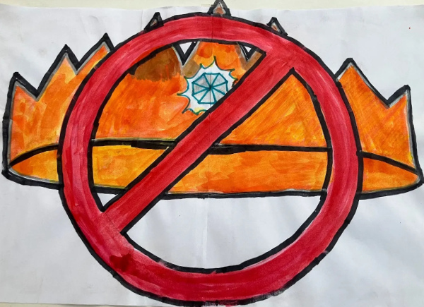 A crown, drawn with markers,
and a red circle with a line through it drawn on top of the crown.
