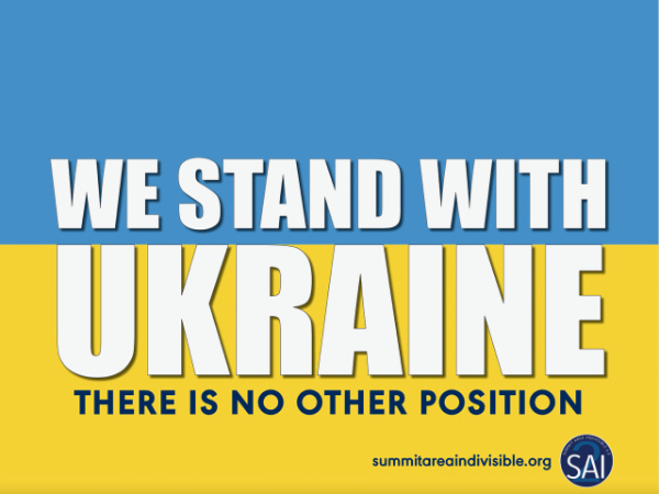 It says 
WE STAND WITH UKRAINE. THERE IS NO OTHER POSITION. summitareaindivisible.org