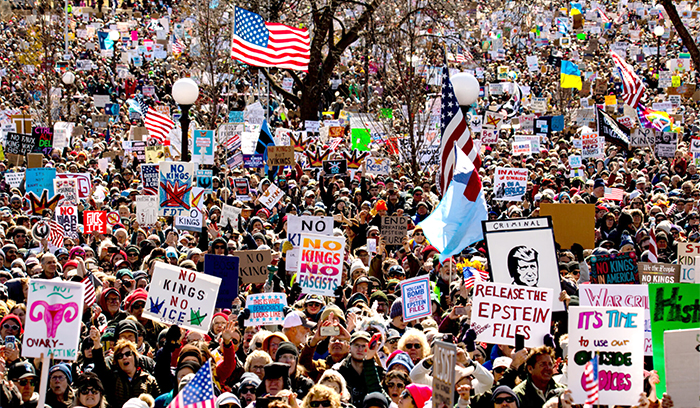 No Kings Day in St. Paul; a very large number of people waving many signs