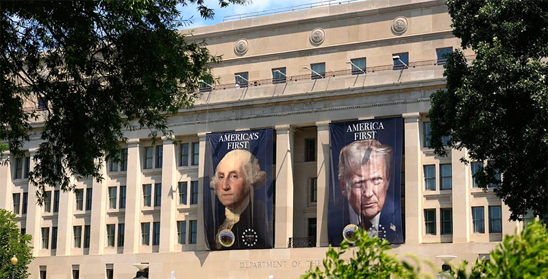 Banner with Washington and Trump on it